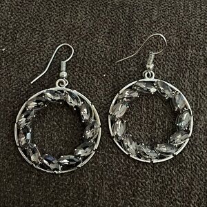 French hook earrings. Faceted gray set in silver-tone.